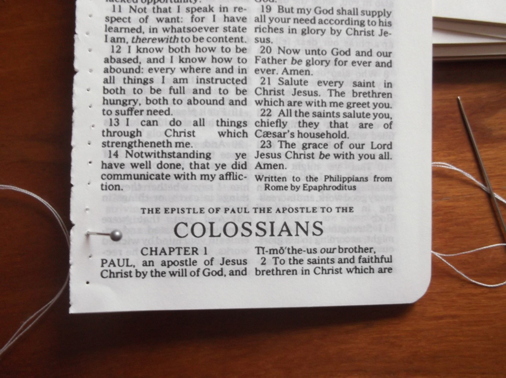 The book of Colossians, extracted from a small modern New Testament, with holes pricked in the left margin with a pin.